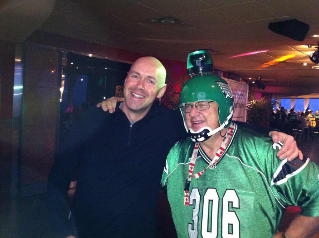 The author with David Ash of Dash Tours at the Riders In the Sky Kickoff Party during the 100th Grey Cup celebrations. David is now the biggest Rider in the sky. 